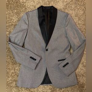 Gray blazer jacket and black dress pants